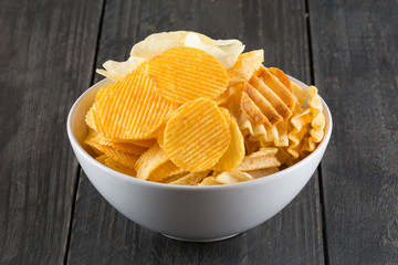 potato chips on wood background