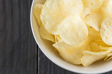 potato chips on wood background