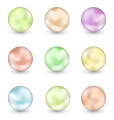 Group of colorful pearls isolated on white background