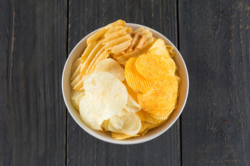 potato chips on wood background
