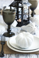 Halloween table decoration in black and white colors