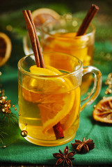 Hot apple cider in a glass cup