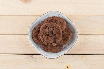 soft dark chocolate brownie cookies on wood