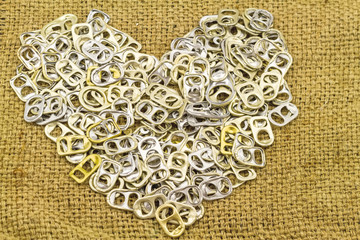 Ring pull aluminum of cans stack as heart shape indicate of new hope