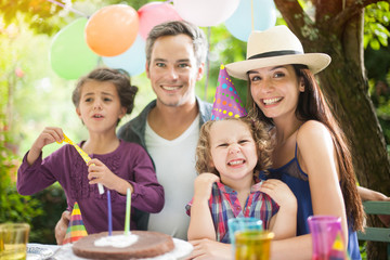 Birthday party in family. Four people family portrait