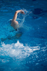 swimmer excercise on indoor swimming poo