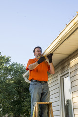 Cleaning Dry Leaves From A Gutter