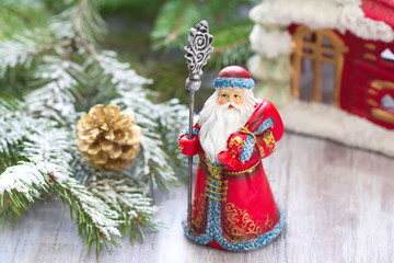 Christmas postcard with Father Frosty and christmas decoration