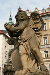 Obraz premium Statue on the Holy Trinity Column (Plague Column) at Lesser Town Square. Prague, Czech Republic