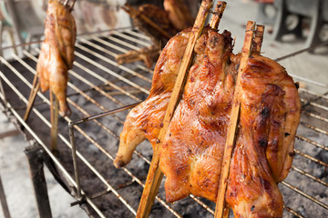 hot roasting chicken on smoked grill barbecue