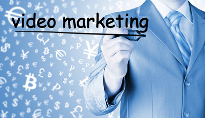 business man writing Video Marketing