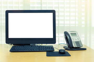 telephone and computer on table work of room service office