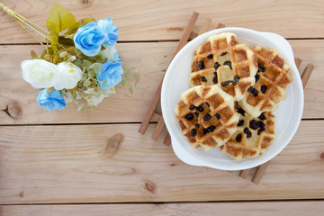 Sweet waffles with rose bouquet