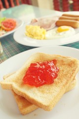 Slice toast bread with strawberry jam
