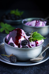 delicious homemade blackberry  ice cream with blackberry topping