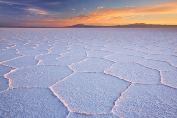 Salt flat Salar de Uyuni in Bolivia at sunrise - obrazy, fototapety, plakaty
