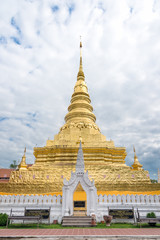 Naklejka premium Golden Pagoda in Phra That Chae Haeng Temple, Nan province