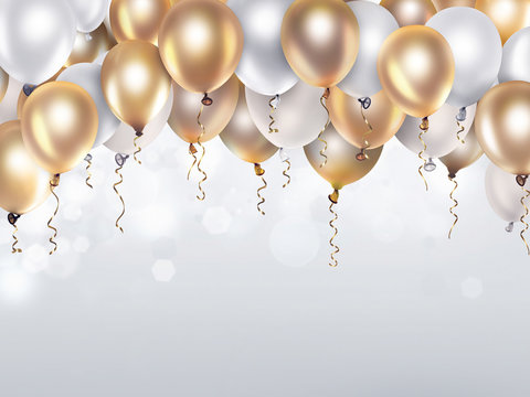 gold and white balloons