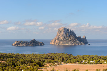 Fototapeta na wymiar Es Vedrà is a small rocky island of the south western seaboard of the Spanish island of Ibiza.