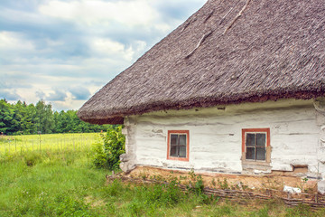 Plakat Ukrainian hut thatched sloping field near