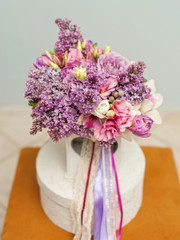 Beautiful wedding bouquet with lilac and eustoma flowers in violet colors