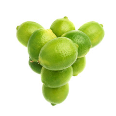 Pile of multiple ripe limes, composition isolated over the white