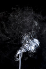Fototapeta premium gray smoke on a black background.