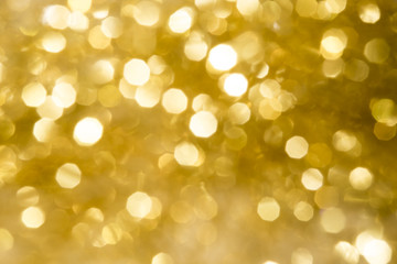 Christmas background and  golden abstract glitter with blurred b