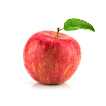 Red apple fruit with leaf isolate on white