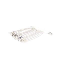 Bunch of safety pins isolated on white background