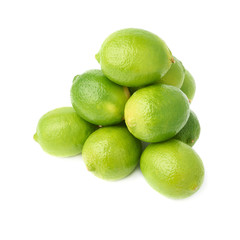 Pile of multiple ripe limes, composition isolated over the white