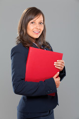 Fototapeta na wymiar Businesswoman holding folders