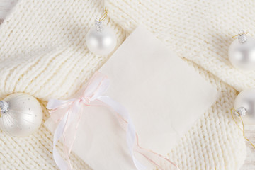 Obraz na płótnie Canvas White Christmas composition on knitted background
