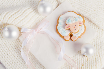 Christmas composition with white gingerbread sheep. Year of the