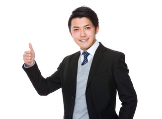 Businessman with thumb up gesture
