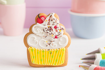 Colorful icing cookies in cupcake shape