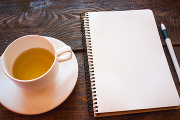 planning set. empty notebook  and a  pen
