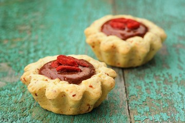 Two tasty homemade fancy vegan cakes with chocolate cream and dr