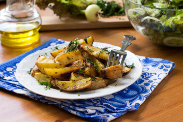 Roasted potato cooked in oven with herbs and olive oil
