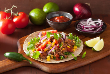 mexican taco with beef tomato salsa onion corn