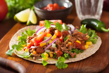 mexican taco with beef tomato salsa onion corn