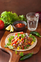 mexican taco with beef tomato salsa onion corn
