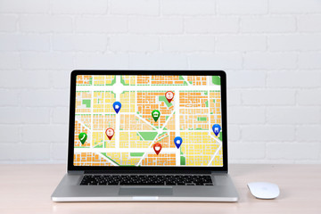 Modern laptop with map gps navigation application