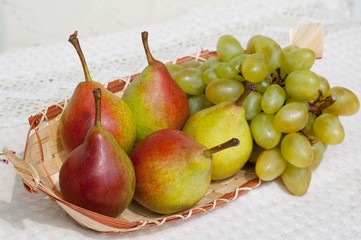 grapes and pears on the table