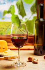 Red wine in glass and bottle