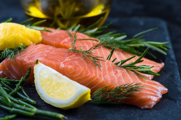 fresh salmon steaks with herbs and lemon