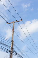 Fototapeta premium Electricity post in blue sky