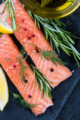 fresh salmon steaks with herbs and lemon