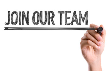 Hand with marker writing the word Join Our Team