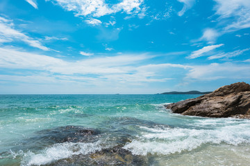Water splash at the stone beach 